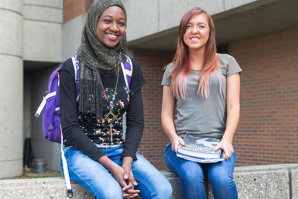 Two students posing for a picture