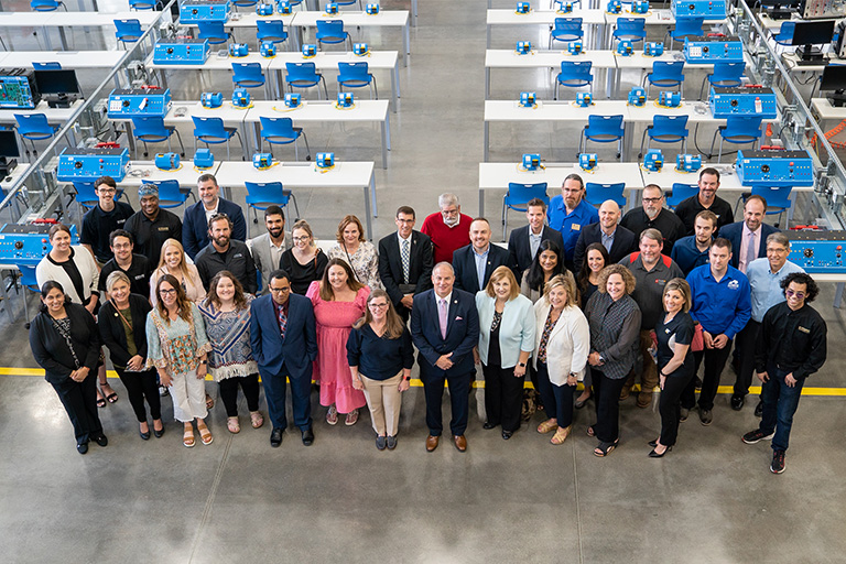 FAME Live participants touring AMIT center